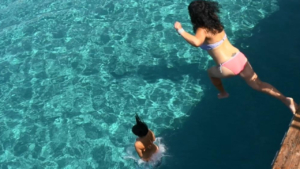 A joyful splash: Diving into the sparkling sea