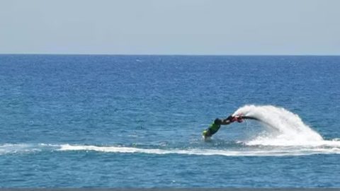 The Flyboard Legend is connected to the PWC by a hose
