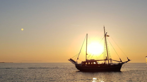 Golden light reflecting on the Aegean waters