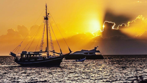 Chasing the sun on a traditional boat in Mykonos
