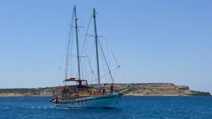 Sailing by the diverse Cycladic coastline