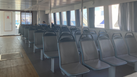 The interior seating area on the boat